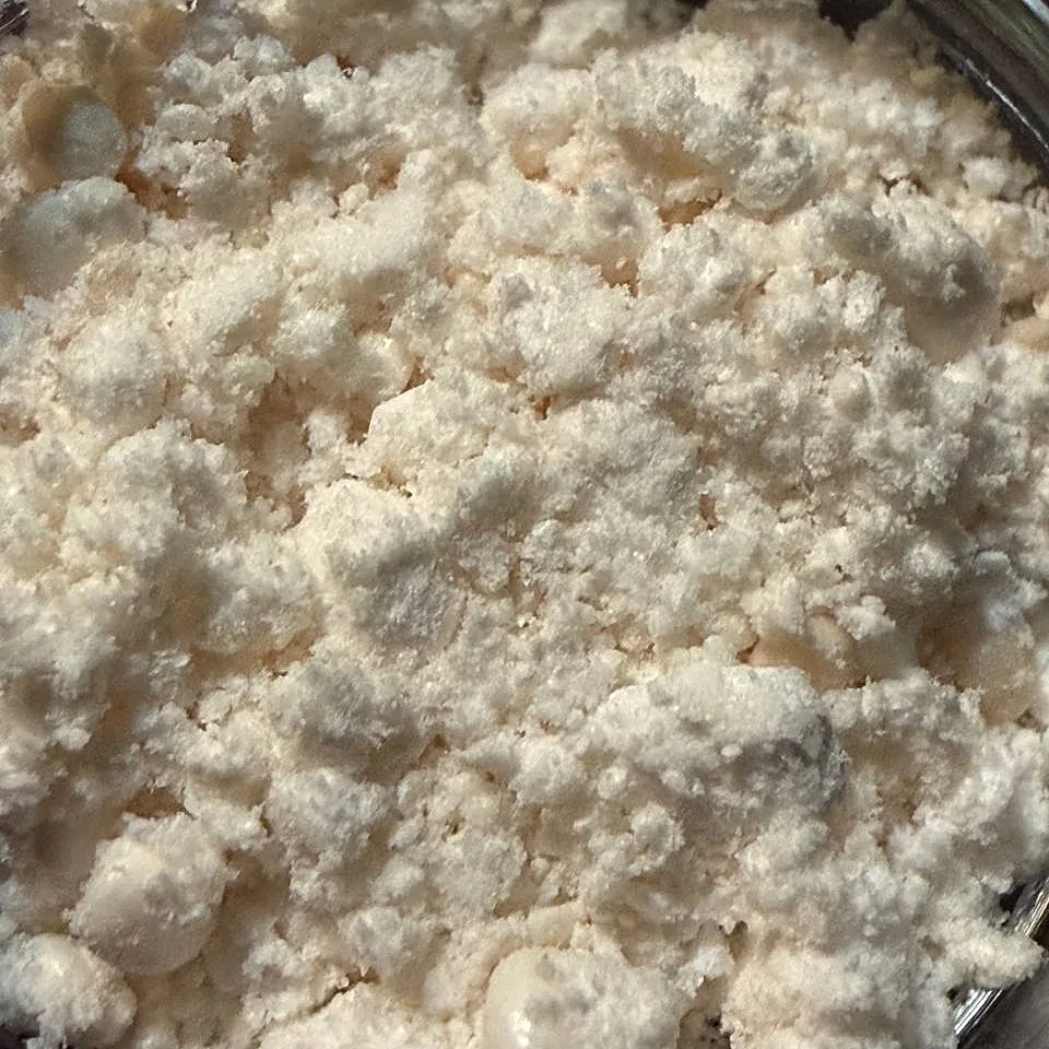 Close-up of pure CBG isolate crystalline powder